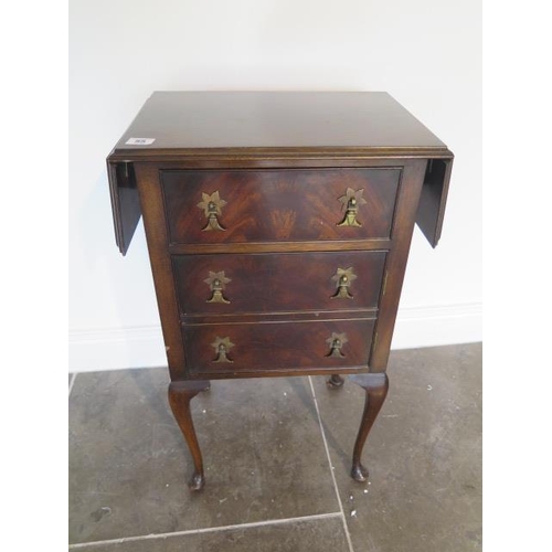 55 - A mahogany single drawer drop leaf bedside table - height 71cm x 65cm extended x 31cm