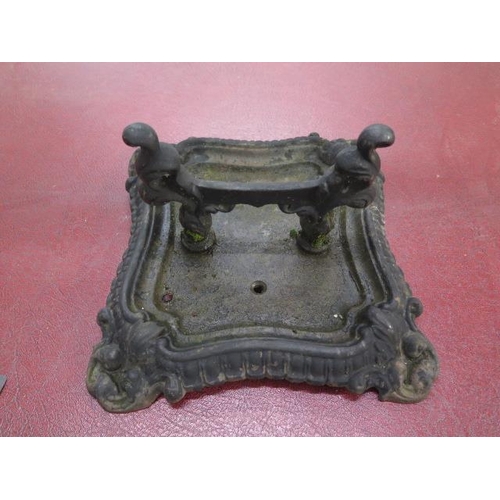 77 - A cast iron footscraper - height 17cm x 30cm x 31cm - generally good