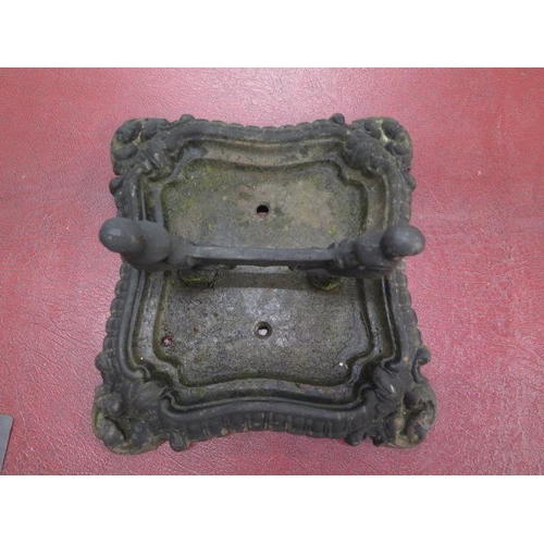 77 - A cast iron footscraper - height 17cm x 30cm x 31cm - generally good