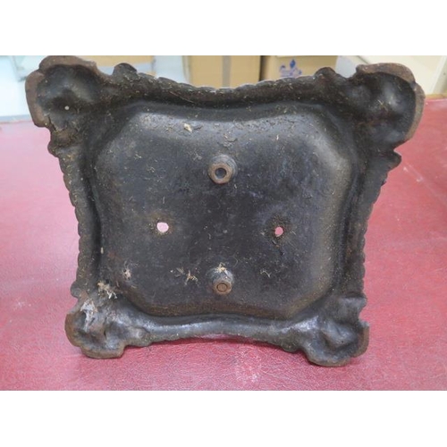 77 - A cast iron footscraper - height 17cm x 30cm x 31cm - generally good