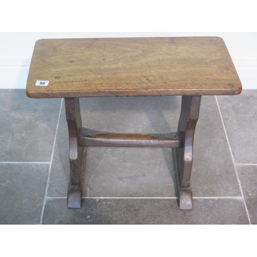 80 - An elm stool - height 42cm x 55cm x 28cm