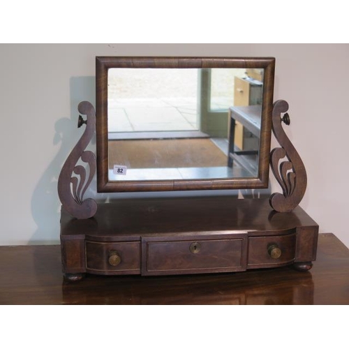 82 - An early 19th century mahogany toilet mirror with three drawers - height 50cm x 60cm x 25cm