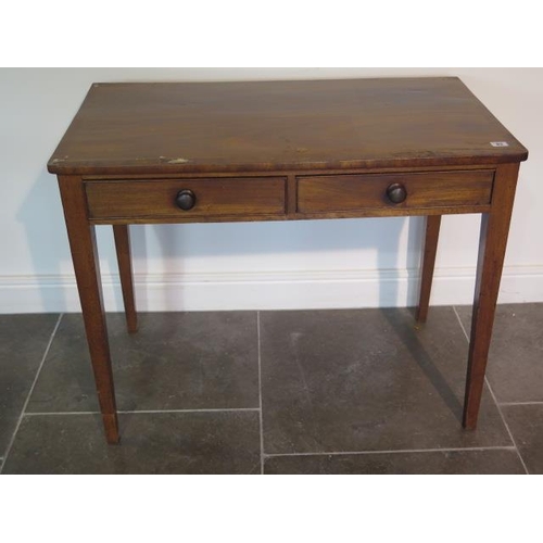 83 - A 19th century mahogany two drawer side table - height 73cm x 92cm x 52cm