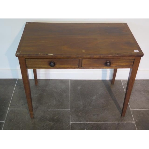 83 - A 19th century mahogany two drawer side table - height 73cm x 92cm x 52cm