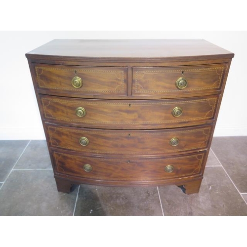 84 - A Goergian inlaid mahogany five drawer bowfronted chest standing on bracket feet - height 102cm x 10... 