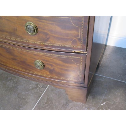 84 - A Goergian inlaid mahogany five drawer bowfronted chest standing on bracket feet - height 102cm x 10... 