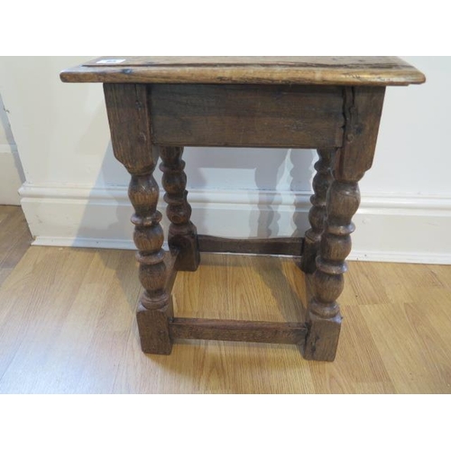 85 - An 18th century oak joint stool on turned supports - height 48cm x 41cm x 25cm