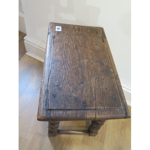 85 - An 18th century oak joint stool on turned supports - height 48cm x 41cm x 25cm