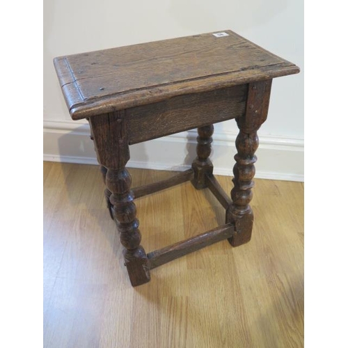 85 - An 18th century oak joint stool on turned supports - height 48cm x 41cm x 25cm