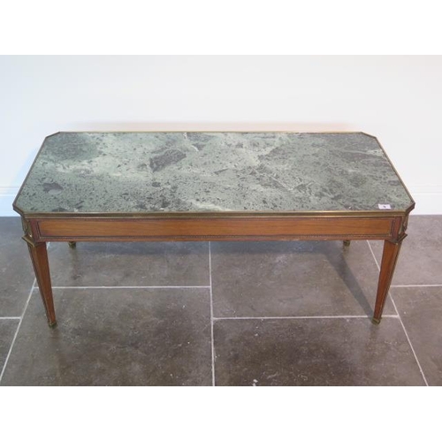 63 - A French green marble top mahogany coffee table with ormolu mounts - height 46cm x 111cm x 51cm - ge... 