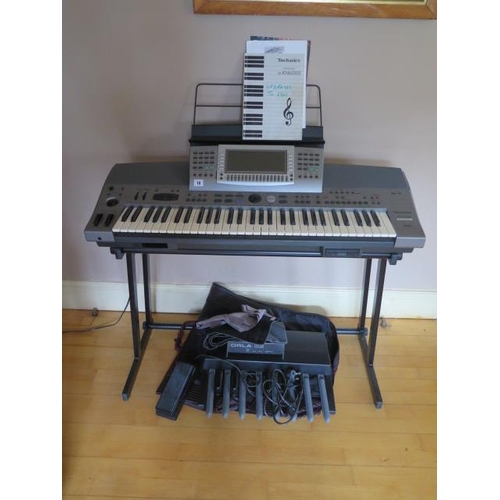 10 - A Technics sx KN6000 electric piano organ on stand with foot pedals, in working order