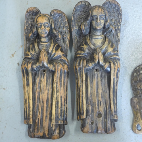 55 - A pair of carved wooden Angels - Height 44cm - a carved wooden corbel - Height 28cm x Width 37cm and... 