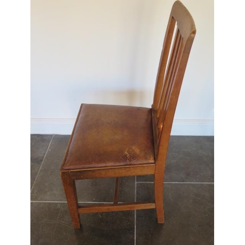 61 - A set of eighteen 20th century dining chairs with leather seat pads, removed from a Cambridge Univer... 