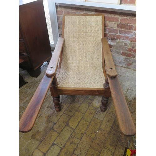 75 - An early 20th century hardwood colonial planters chair, 83cm tall x 117cm deep, without extensions 6... 