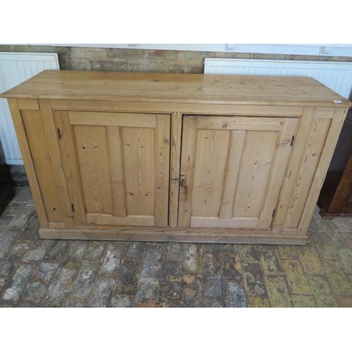 80 - A Victorian stripped pine two door cupboard, 87cm tall x 158cm x 50cm, condition consistent with age... 