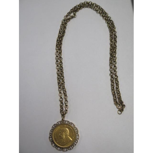 A fine gold 10z Krugerrand coin, dated 1974, in a hallmarked 9ct yellow gold mount and 76cm 9ct chain, total weight approx 89.5 grams