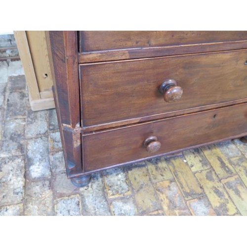 85 - A 19th century mahogany five drawer chest on turned feet, some losses and wear consistent with use, ... 