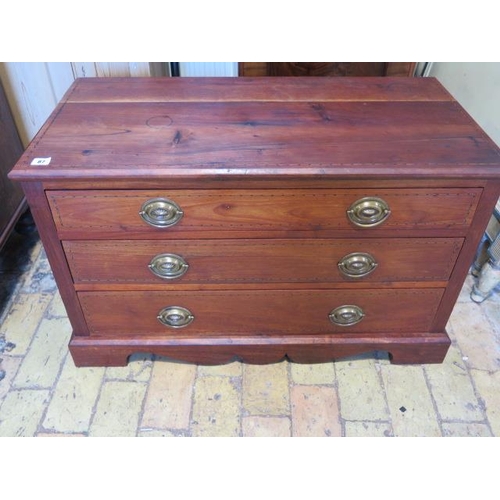 87 - An inlaid mahogany three drawer chest, 54cm tall x 90cm x 45cm