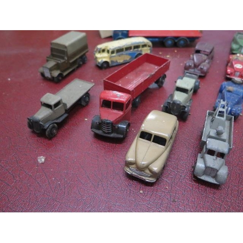 928 - A collection of 23 vintage diecast vehicles mostly Dinky including a Foden flat bed truck 502 with b... 