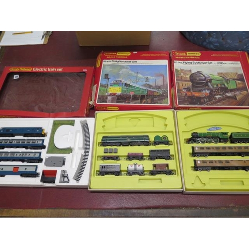 929 - Three Hornby OO Gauge boxed train sets RS608 Flying Scotsman RS 651 Freightmaster set and Royal Mail... 