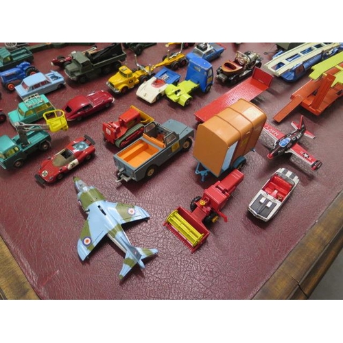 932 - A collection of assorted diecast vehicles and toys including two Dinky planes, Military Astra search... 