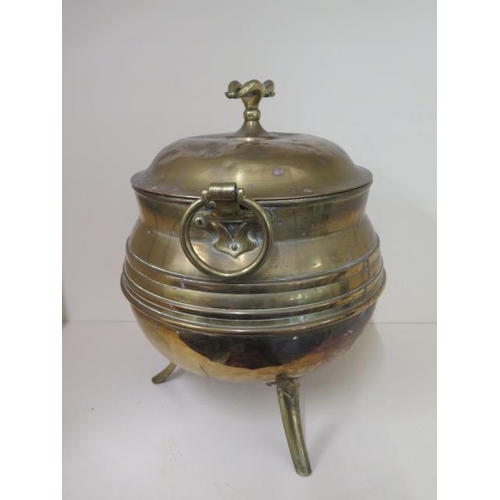 91 - A brass cauldron shape coal / log bin, 40cm tall x 30cm wide, some small dents but generally a good ... 