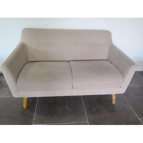 27 - An oatmeal two seater sofa, 77cm tall x 144cm x 84cm
