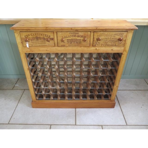 46A - A new pine 70 bottle wine rack with three wine box front drawers made by a local craftsman to a high... 