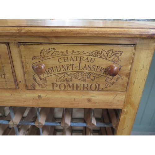 46A - A new pine 70 bottle wine rack with three wine box front drawers made by a local craftsman to a high... 