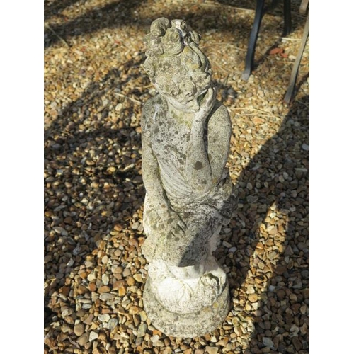 48 - A stone effect concrete statue, 70cm tall