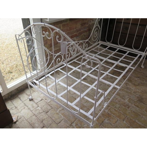 55 - A 20th century ornate wrought iron folding campaign bed, 109cm tall x 100cm wide x 188cm long, recen... 