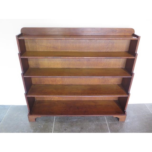 70 - Early 20th century waterfall bookshelves, 99cm tall x 110cm x 27cm, in polished condition