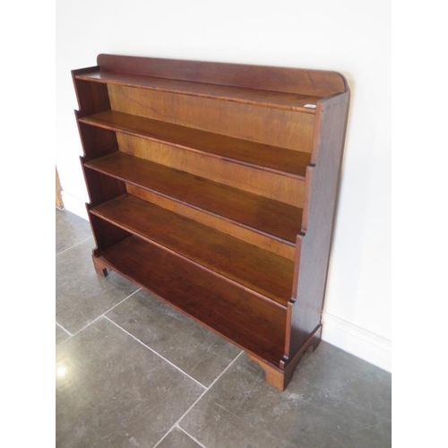 70 - Early 20th century waterfall bookshelves, 99cm tall x 110cm x 27cm, in polished condition