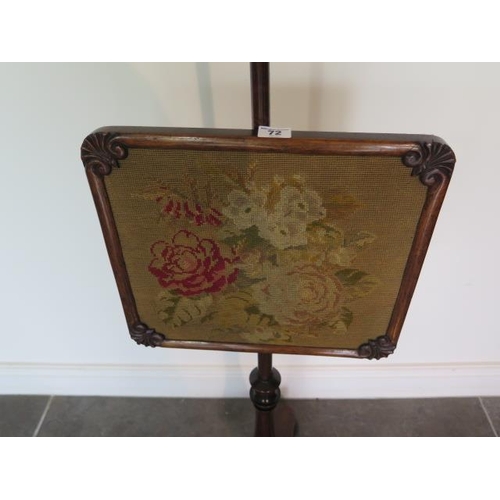 72 - An early Victorian rosewood pole screen with embroided banner in good condition, 142cm tall