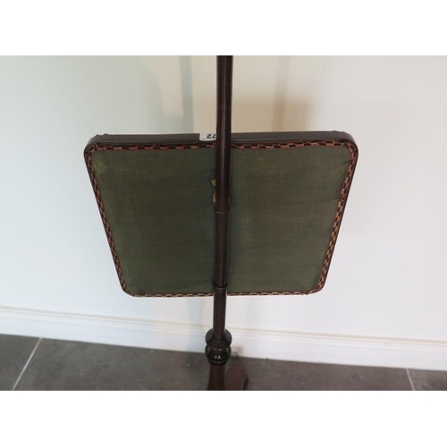 72 - An early Victorian rosewood pole screen with embroided banner in good condition, 142cm tall