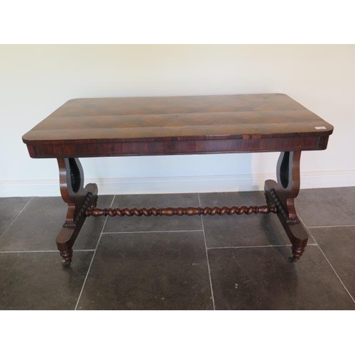 82 - A 19th century rosewood and burr walnut stretcher table on lyre end supports united by a barley twis... 