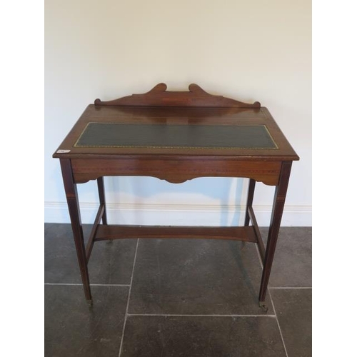85 - A nice Edwardian writing desk with boxwood and stringing inlay, tapered legs with brass castors, lea... 