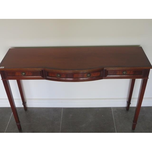 11 - A mahogany Georgian style three drawer hall / serving table, 84cm tall x 130cm x 40cm