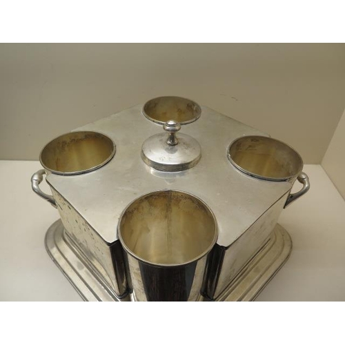 12 - A modern plated four bottle wine cooler, 22cm tall x 31cm x 31cm, in good condition