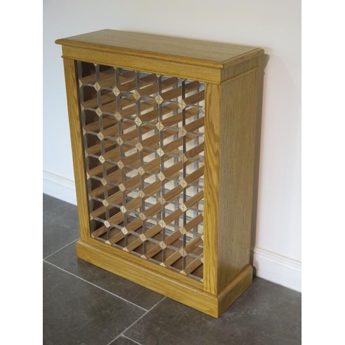 23 - A new oak 48 bottle wine rack, made by a local craftsman to a high standard, 96cm tall x 74cm x 27cm