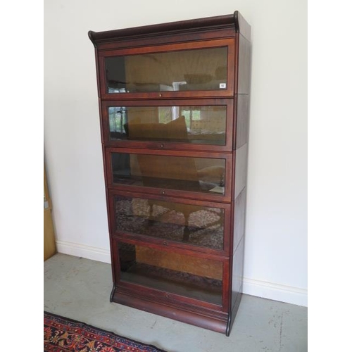 62 - A stained beechwood five section stacking glazed Wernicke style bookcase, 180cm tall x 87cm wide x 3... 