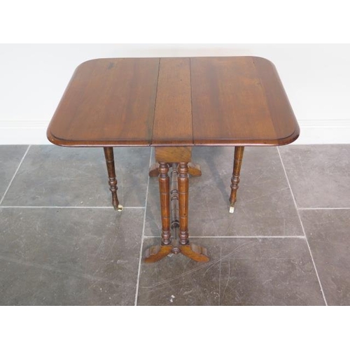 79 - A Victorian walnut drop leaf Sutherland side table, 54cm tall x 55cm x 71cm, in generally good condi... 