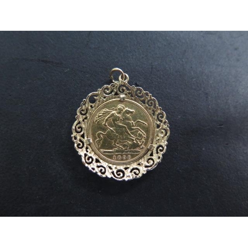 868 - A Victorian gold half sovereign in a 9ct gold mount, total weight approx 7 grams