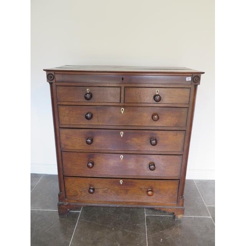 89 - A Georgian oak and mahogany six drawer chest with an additional secret top drawer, some losses mainl... 