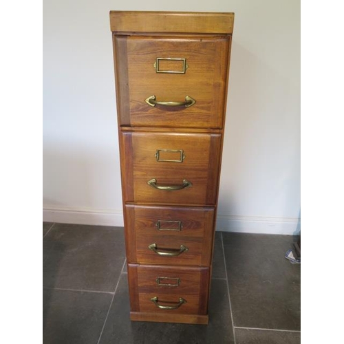 90 - A four drawer filing cabinet, the pine drawer marked The Pre-Eminent Filing Cabinet Registered desig... 