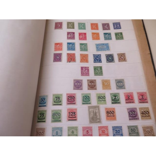 985 - A collection of World stamps in five albums and loose in envelopes