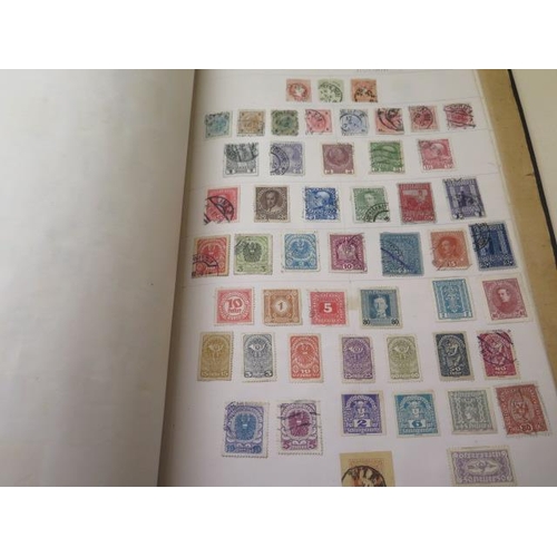 985 - A collection of World stamps in five albums and loose in envelopes