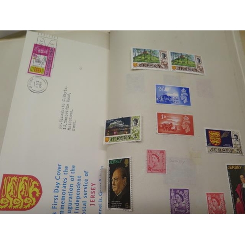 985 - A collection of World stamps in five albums and loose in envelopes