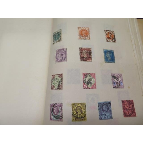 985 - A collection of World stamps in five albums and loose in envelopes