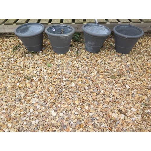 25 - Four grey small frost proof plant pots, diameter 30cm